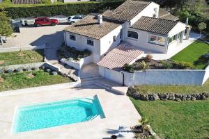 an aerial view of a house with a swimming pool at Mas Madilauric 2 BNB in Peymeinade