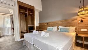 Ein Bett oder Betten in einem Zimmer der Unterkunft Caleta Dorada