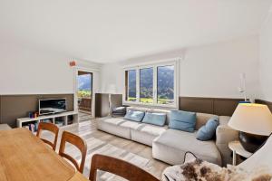 Istumisnurk majutusasutuses Sunny Design Chalet in Engelberg with spectacular view on Mount Titlis