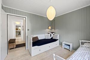 Voodi või voodid majutusasutuse Sunny Design Chalet in Engelberg with spectacular view on Mount Titlis toas