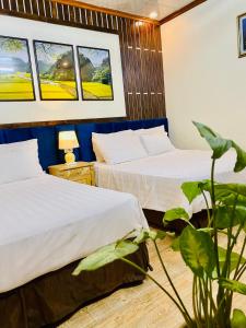 Ένα ή περισσότερα κρεβάτια σε δωμάτιο στο Tam Coc Little river Bungalow +26 φωτογραφίες