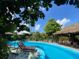 Πισίνα στο ή κοντά στο Tam Coc Little river Bungalow