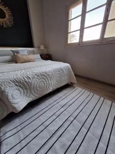 Una cama o camas en una habitación de Posada Del Angel