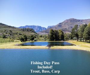 a sign that reads fishing day pass included trout bass camp at La Ferme Guest Farm in Franschhoek