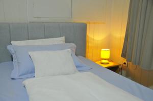 Katil atau katil-katil dalam bilik di Bezdan Guesthouse