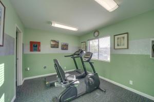 a gym with two exercise bikes in a room at The Painted Pony Condo with Pool and Gym Access! in Sedona