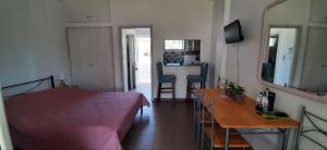 Kuchyň nebo kuchyňský kout v ubytování Leylandi rooms