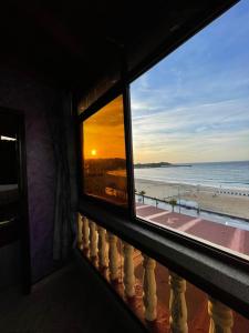 a window view of the beach from a house at Appartement el hichou 1 in Ksar es Sghir