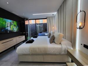 Postel nebo postele na pokoji v ubytování suites home ruidera