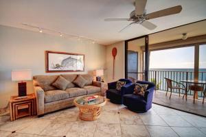 a living room with a couch and chairs and a table at KIHEI BEACH, #506^ condo in Kihei +23 photos