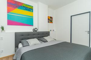 Postel nebo postele na pokoji v ubytování Apartmány KRAKENS