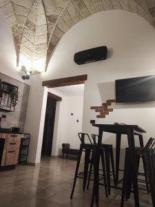 TV a/nebo společenská místnost v ubytování Loft Porta Sud Civ.33