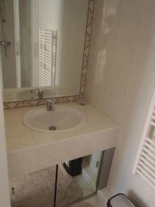 Koupelna v ubytování Appartement Les Alizés