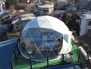 a dome house on top of a building at Brooch Boutique Hotel in Tbilisi City