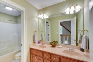 a bathroom with a sink and a mirror at Lakefront Hartwell Retreat with Gas Grill and Deck! in Hartwell +26 photos