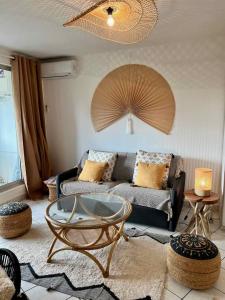 Photo de la galerie de l'établissement Appartement 'Kribi' proche plage de Boucan Canot, à Saint-Gilles les Bains 1 autre photo