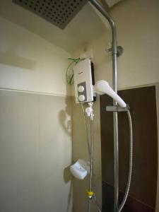 Ένα μπάνιο στο Breeze Residences 26th floor