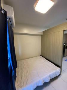 Ένα ή περισσότερα κρεβάτια σε δωμάτιο στο Breeze Residences 26th floor