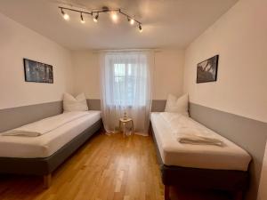 Letto o letti in una camera di Stadthaus 1911
