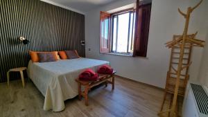 Posteľ alebo postele v izbe v ubytovaní Pollino House