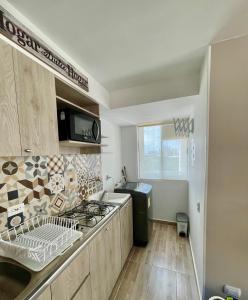 Dapur atau dapur kecil di Hermoso apartamento para estrenar
