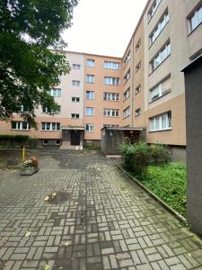 an empty courtyard in front of a building at Zawadzkiego 104 in Szczecin
