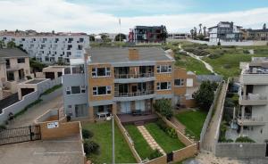 an aerial view of an apartment building at Seacret Whale in Bloubergstrand +23 photos
