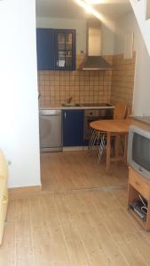 Kuchyň nebo kuchyňský kout v ubytování Apartments Lina + 23 fotografií