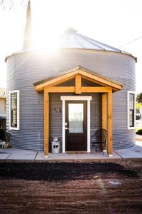 a house with a front porch with a door at Silo Suite 1 Pet Friendly- Near Zion National Park in La Verkin