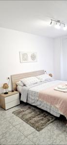 A bed or beds in a room at Apartamento Casa Tambo, Campelo