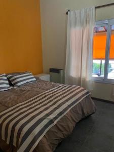 Postel nebo postele na pokoji v ubytování Casa del Lago