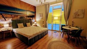 Łóżko lub łóżka w pokoju w obiekcie Studio Appartment Heinze