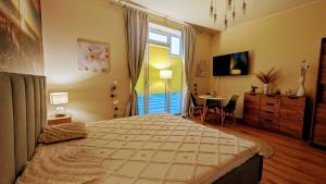 Łóżko lub łóżka w pokoju w obiekcie Studio Appartment Heinze