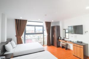 Kuchyň nebo kuchyňský kout v ubytování TTR Midtown View Hotel