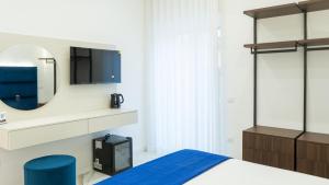 Letto o letti in una camera di Aries Suite Pompei