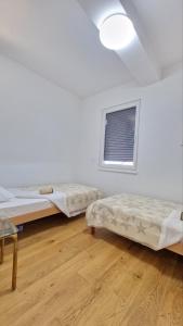 Ένα ή περισσότερα κρεβάτια σε δωμάτιο στο Apartment 501