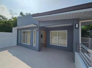 a house with a large patio in front of it at Mountain View in Binangonan