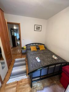 Posteľ alebo postele v izbe v ubytovaní Apartman West - private parking place