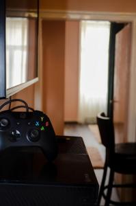 TV a/nebo společenská místnost v ubytování Flamingo Rezidencia Apartman