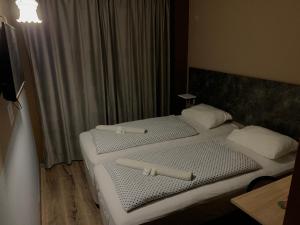 Cama o camas de una habitación en Pasa Han Hotel M1autópálya