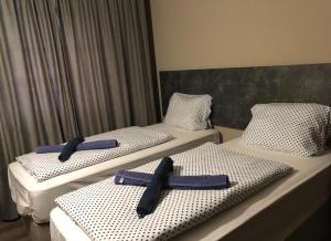 Cama o camas de una habitación en Pasa Han Hotel M1autópálya