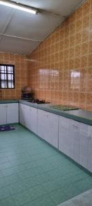 Kuchyň nebo kuchyňský kout v ubytování My Homestay Tronoh Seri Iskandar