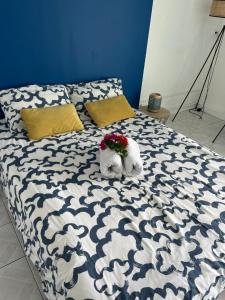 Letto o letti in una camera di Studio de l'Anse Mitan