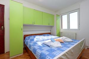 Postel nebo postele na pokoji v ubytování Apartments with WiFi Rijeka - 16539
