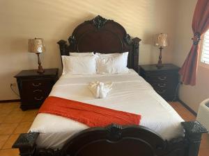 Letto o letti in una camera di Paradise Island