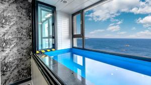 Fotografie z fotogalerie ubytování Beachhill Pool Villa v destinaci Kjongdžu