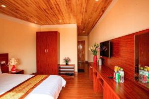 Postel nebo postele na pokoji v ubytování Spring hotel