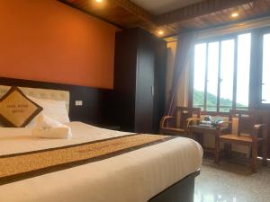 Postel nebo postele na pokoji v ubytování Spring hotel