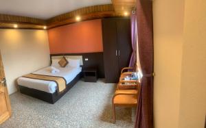 Postel nebo postele na pokoji v ubytování Spring hotel