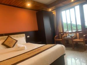 Postel nebo postele na pokoji v ubytování Spring hotel